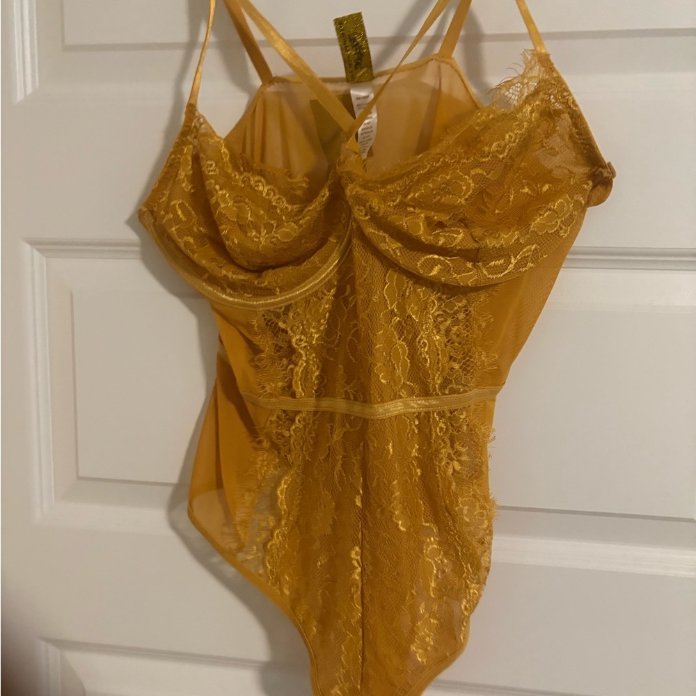 Ashley Stewart Mustard Lace Bodysuit. NWT. Size 1X